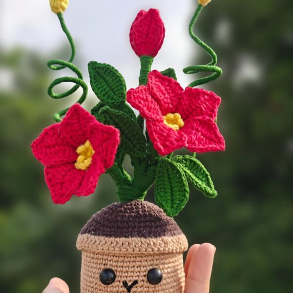 Smiling Crochet Flower Pot with Red Blooms – Handmade & Whimsical